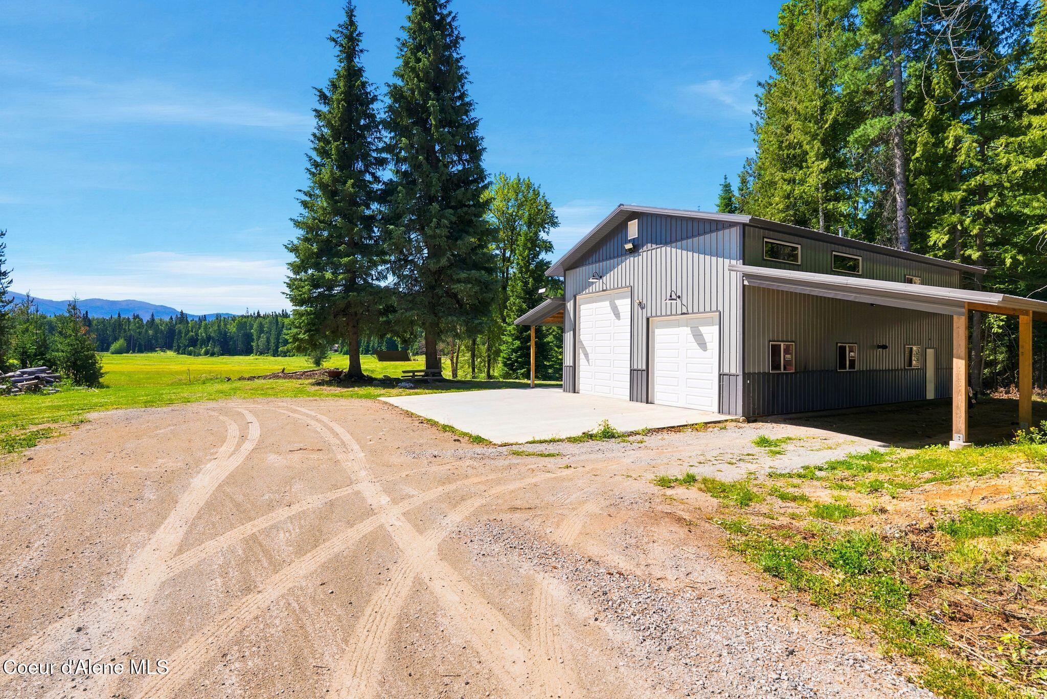 3566 Upper Gold Creek Road Sandpoint, ID 83864 - Photo 3 of 21 Shop Home Daytime