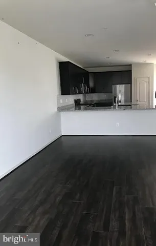 a view of livingroom with furniture and a window