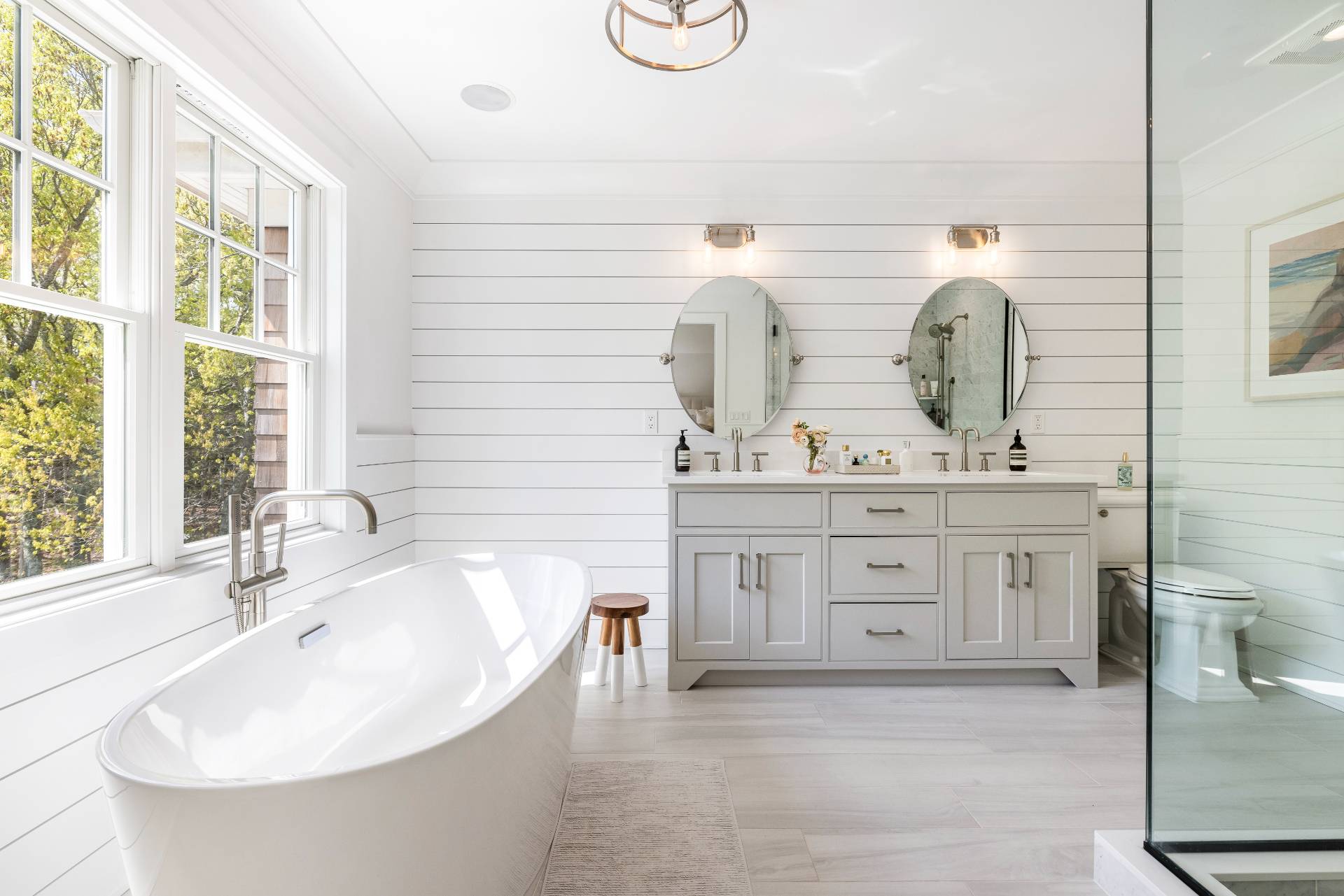7 Park Street East Hampton, NY 11937 - Photo 13 of 23 a bathroom with a double vanity sink a mirror and a