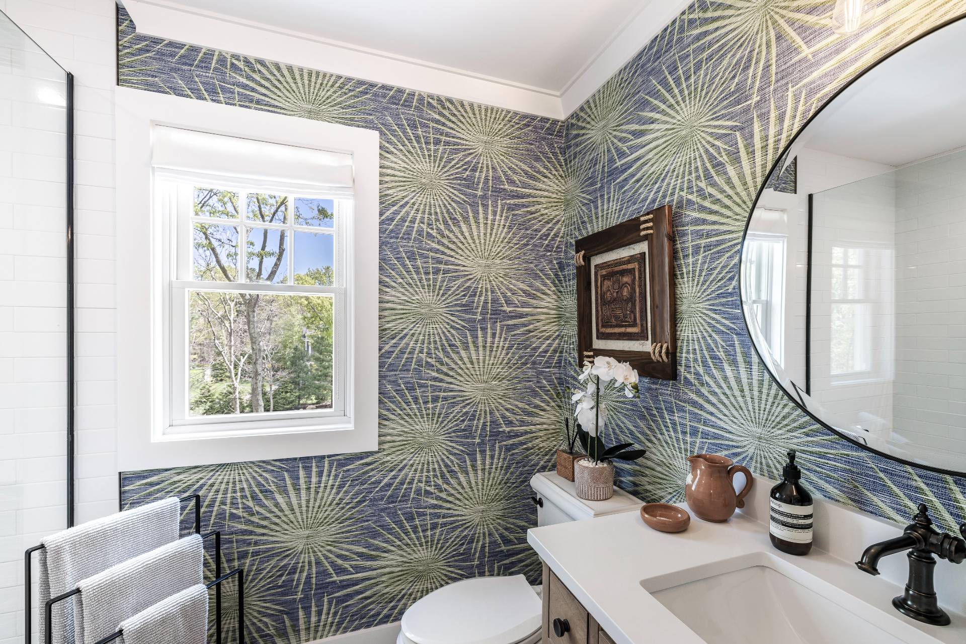 7 Park Street East Hampton, NY 11937 - Photo 10 of 23 a bathroom with a sink a toilet and a mirror