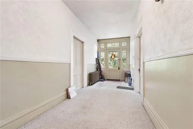 a view of a livingroom with wooden floor