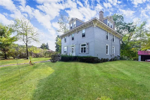 a view of outdoor space with deck and yard