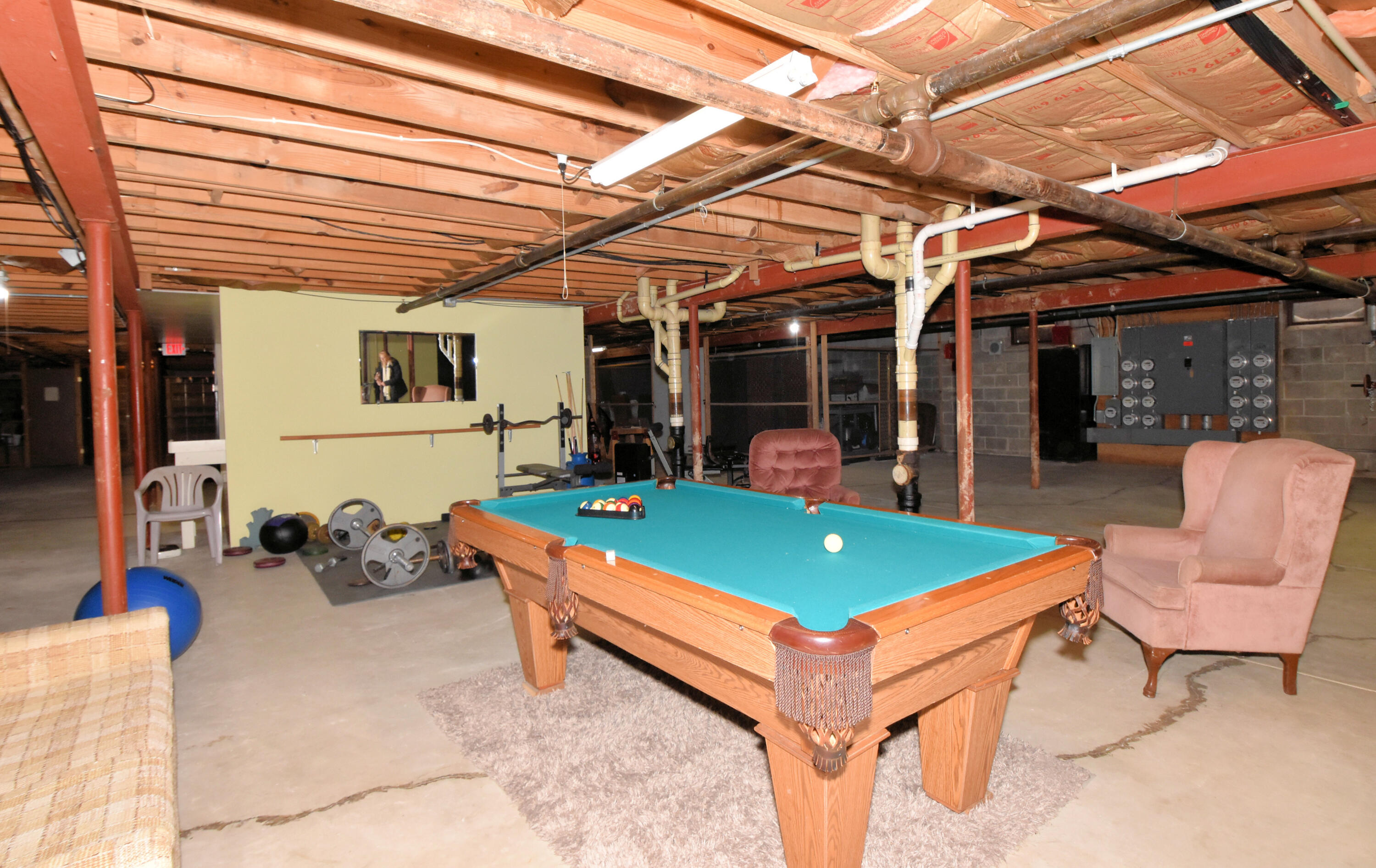 3621 St Andrews Court, Unit 107 Racine, WI 53405 - Photo 24 of 26 Pool table and exercise area