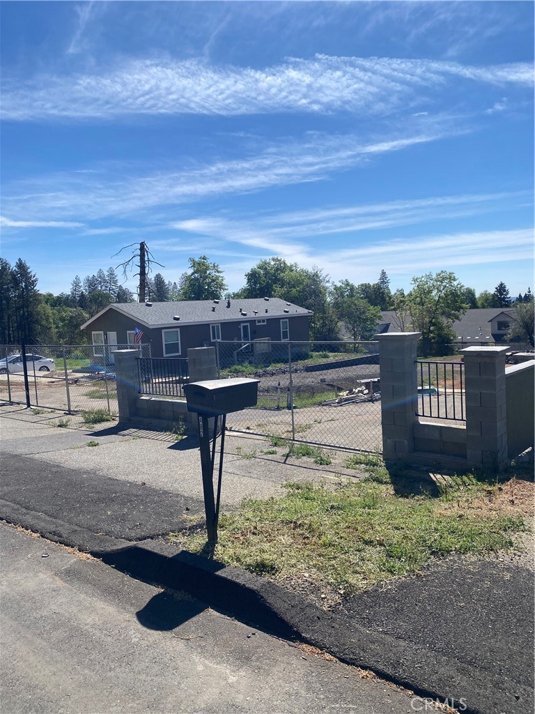482 Nunneley Road Paradise, CA 95969 - Photo 6 of 6 a view of a lake with a yard