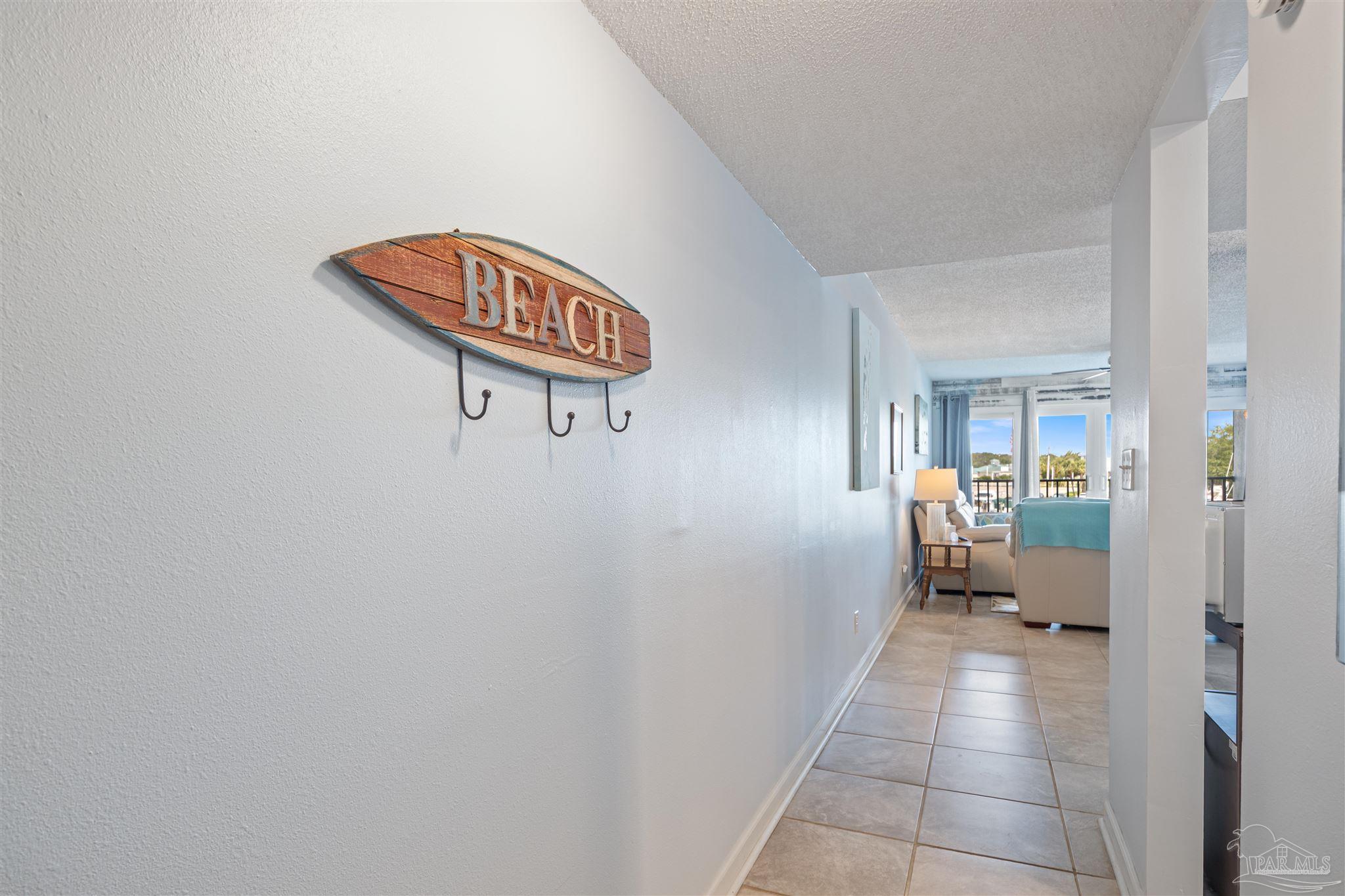 14100 River Road, Unit 228B Pensacola, FL 32507 - Photo 5 of 41 a walk in closet and view of bathroom
