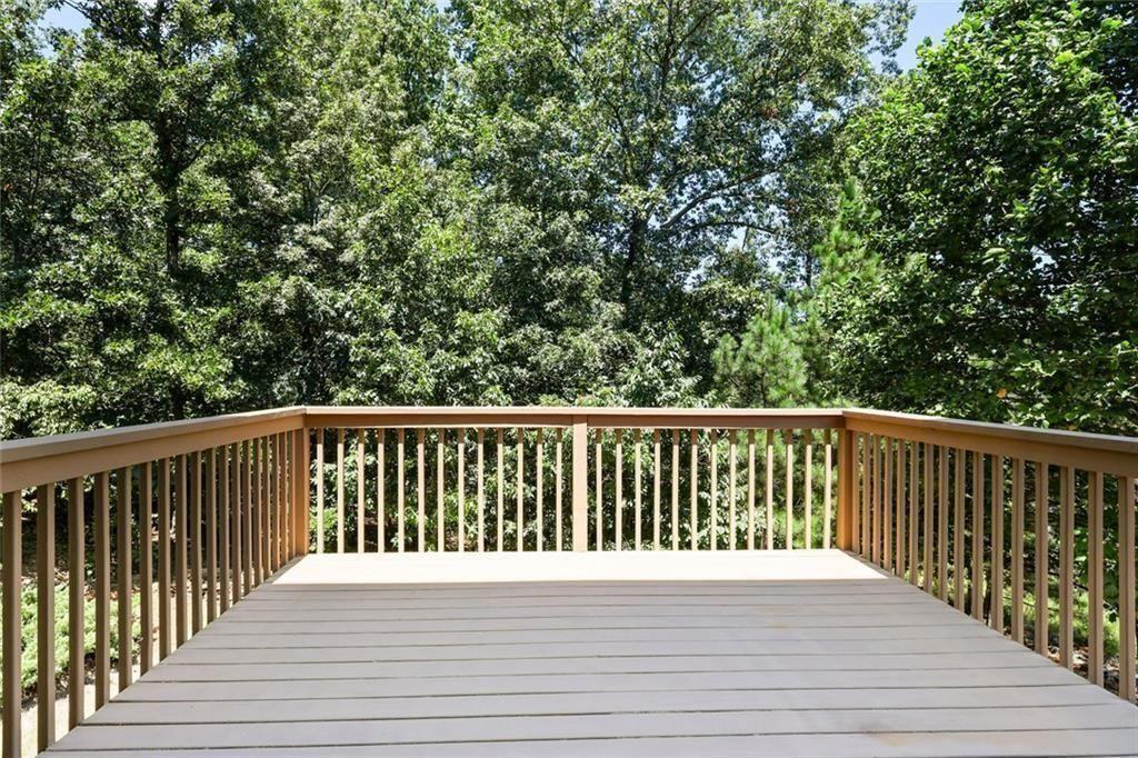 3935 Silver Springs Road Cumming, GA 30041 - Photo 15 of 37 a view of balcony with wooden floor