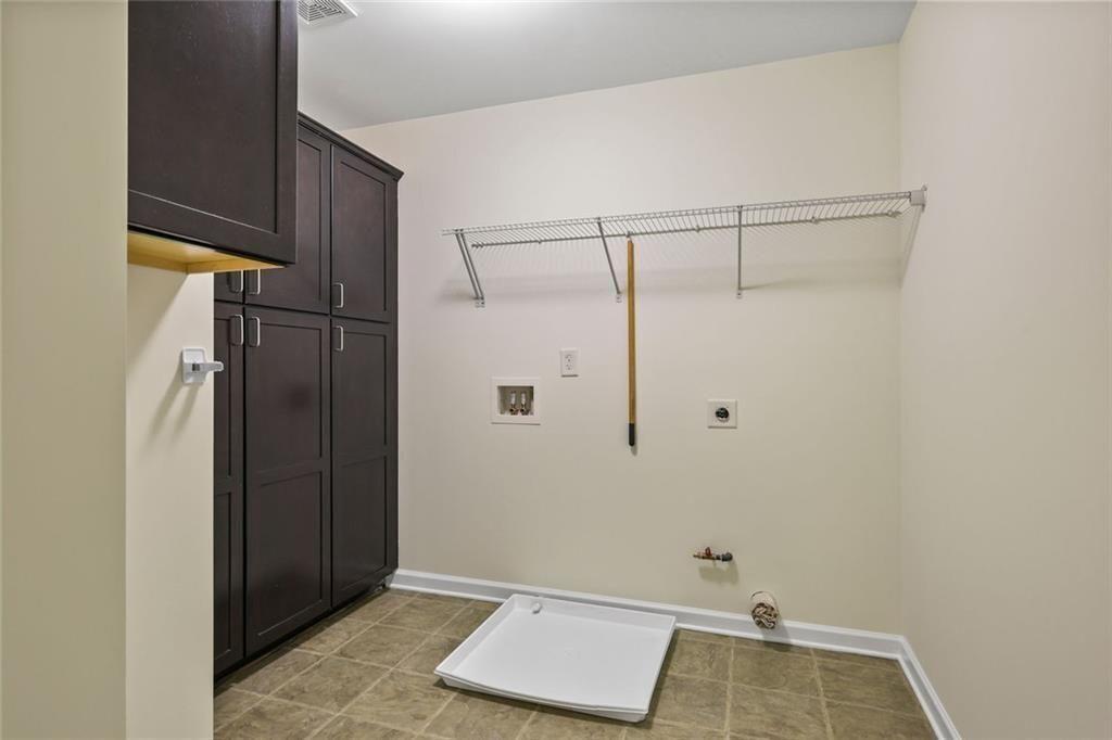 3935 Silver Springs Road Cumming, GA 30041 - Photo 29 of 37 a view of a room with rack on the wall