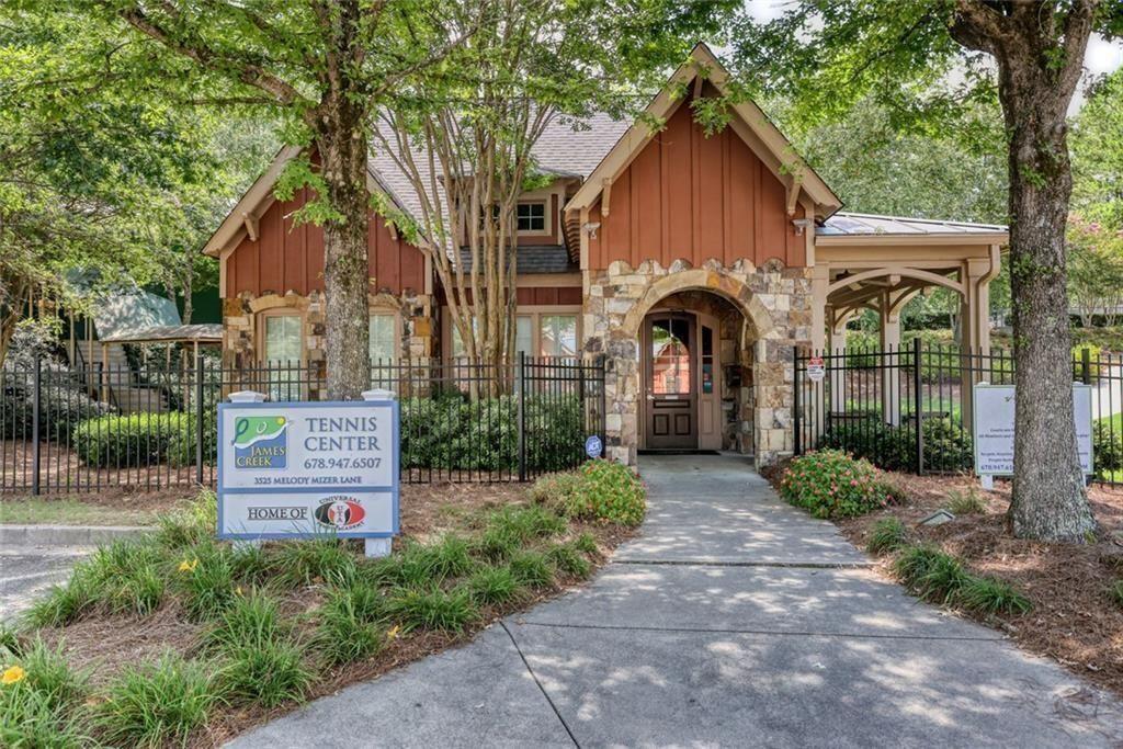 3935 Silver Springs Road Cumming, GA 30041 - Photo 37 of 37 a front view of a house with garden
