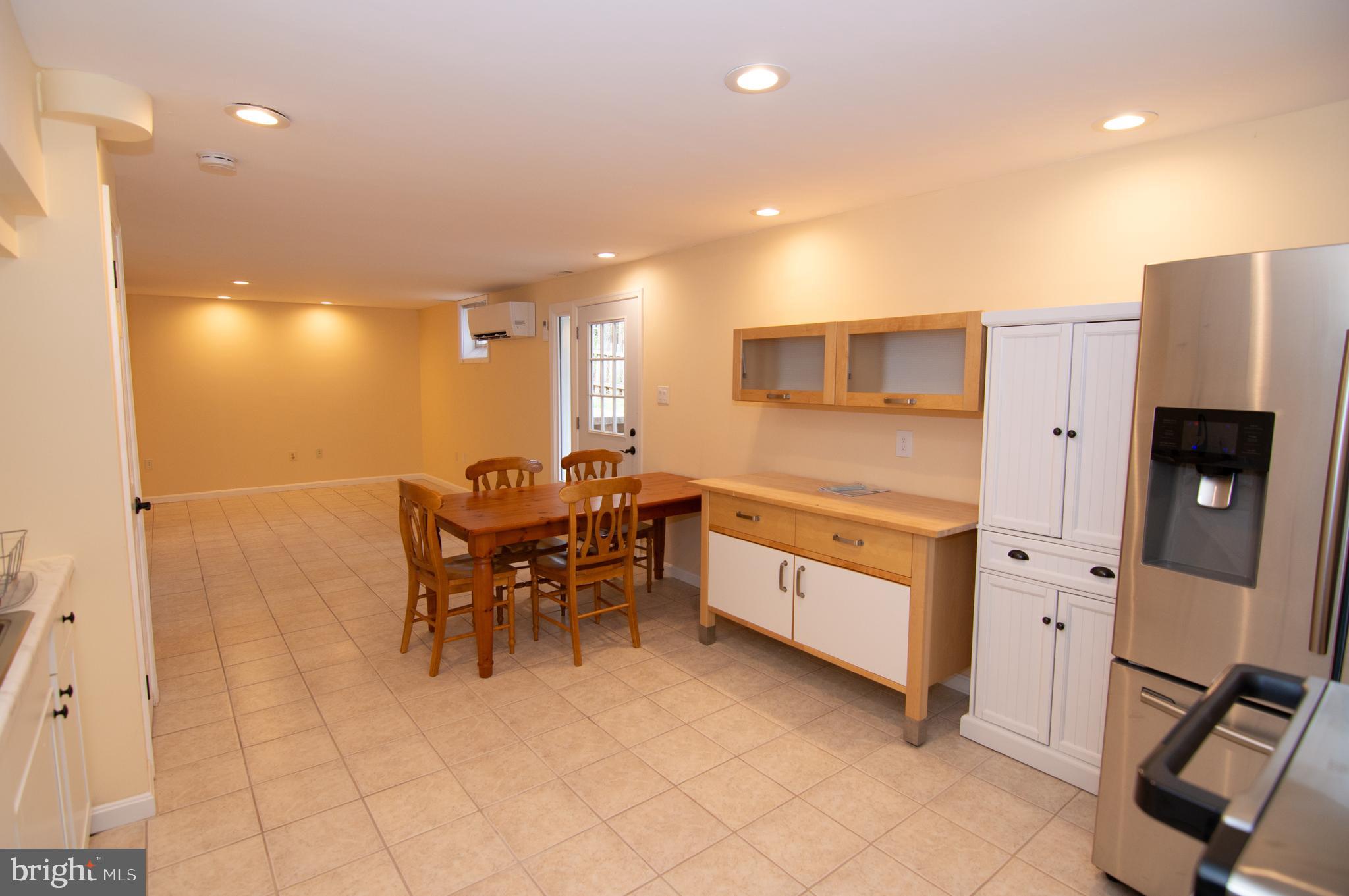 404 Talahi Road Southeast Vienna, VA 22180 - Photo 16 of 31 Kitchen / Living Room / Dining Room