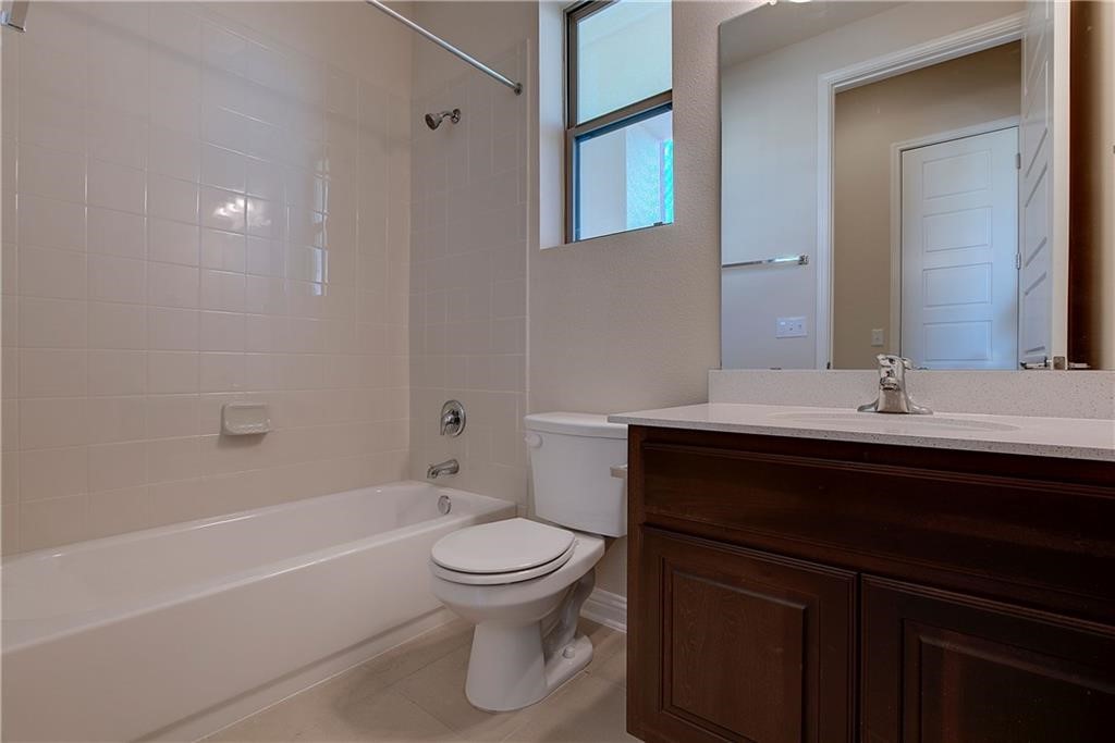 6907 Idea Road Austin, TX 78741 - Photo 15 of 29 Main level full bath off the hall way at the entryway