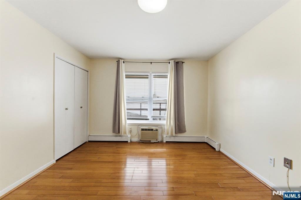 50-56 High Street, Unit 2 Passaic, NJ 07055 - Photo 15 of 30 a view of a room with wooden floor