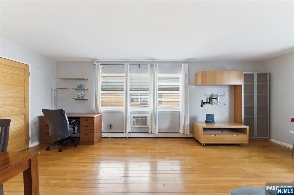 50-56 High Street, Unit 2 Passaic, NJ 07055 - Photo 20 of 30 a view of a livingroom with furniture and a window