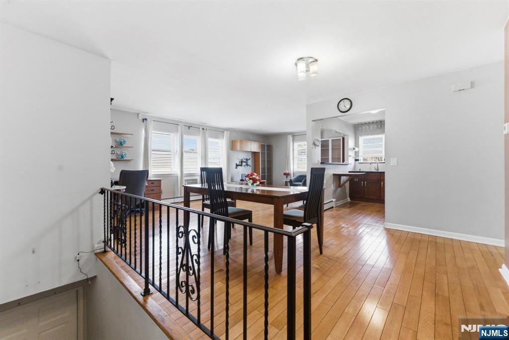 50-56 High Street, Unit 2 Passaic, NJ 07055 - Photo 2 of 30 a view of a living room and dining room