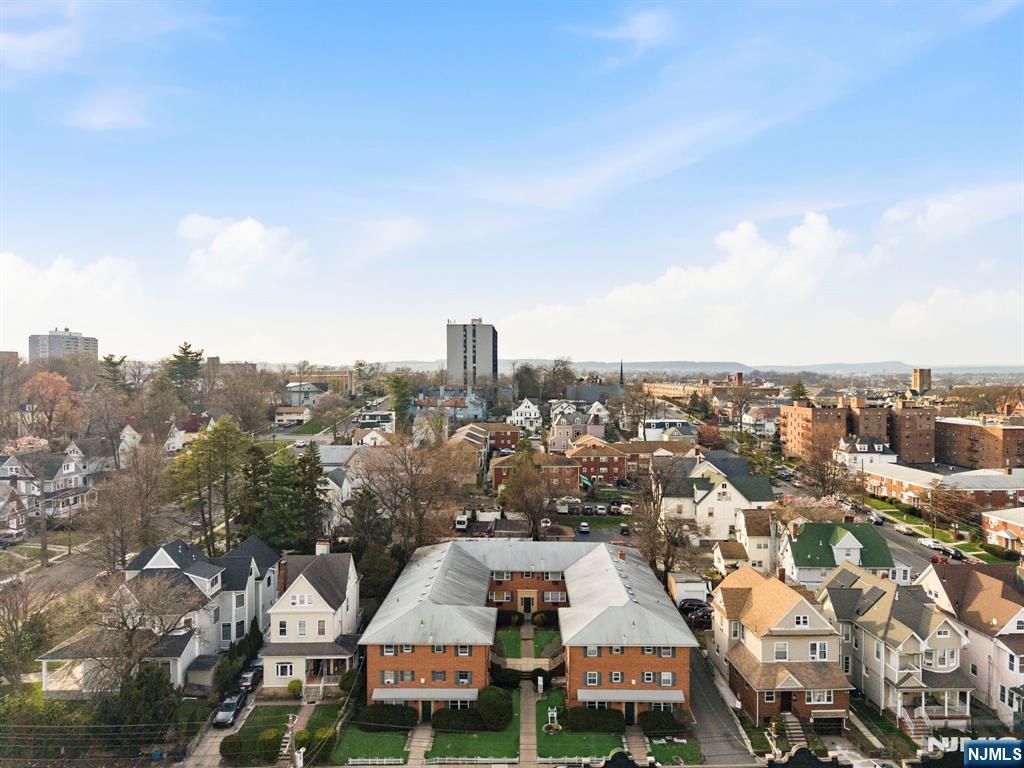 50-56 High Street, Unit 2 Passaic, NJ 07055 - Photo 30 of 30 an aerial view of a city with lots of residential buildings