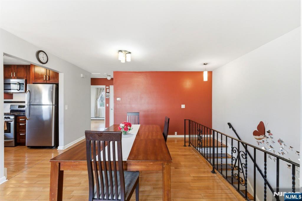 50-56 High Street, Unit 2 Passaic, NJ 07055 - Photo 8 of 30 a view of a balcony dining area with furniture