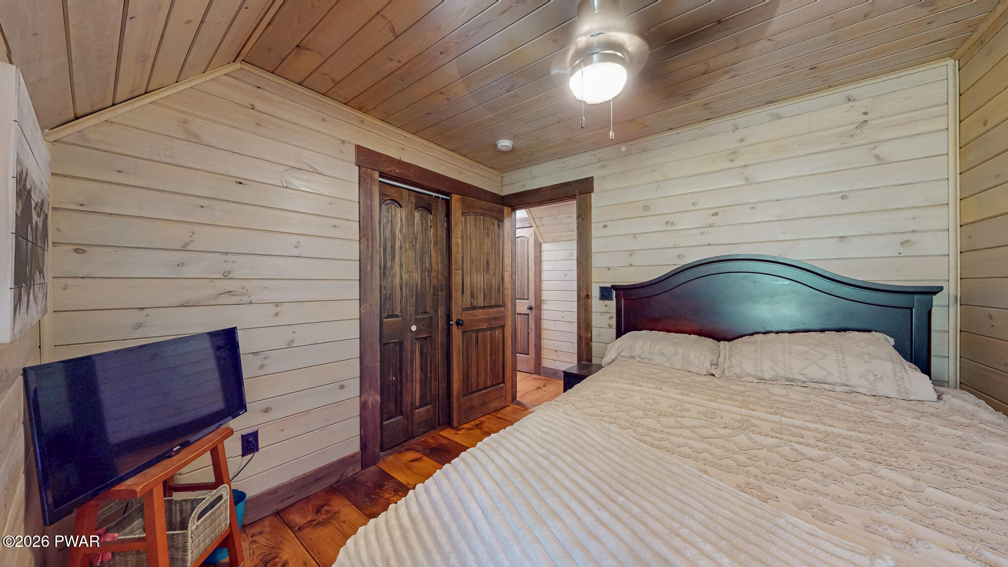 149 Sheards Road Milanville, PA 18443 - Photo 40 of 57 a bedroom with a bed and a dresser