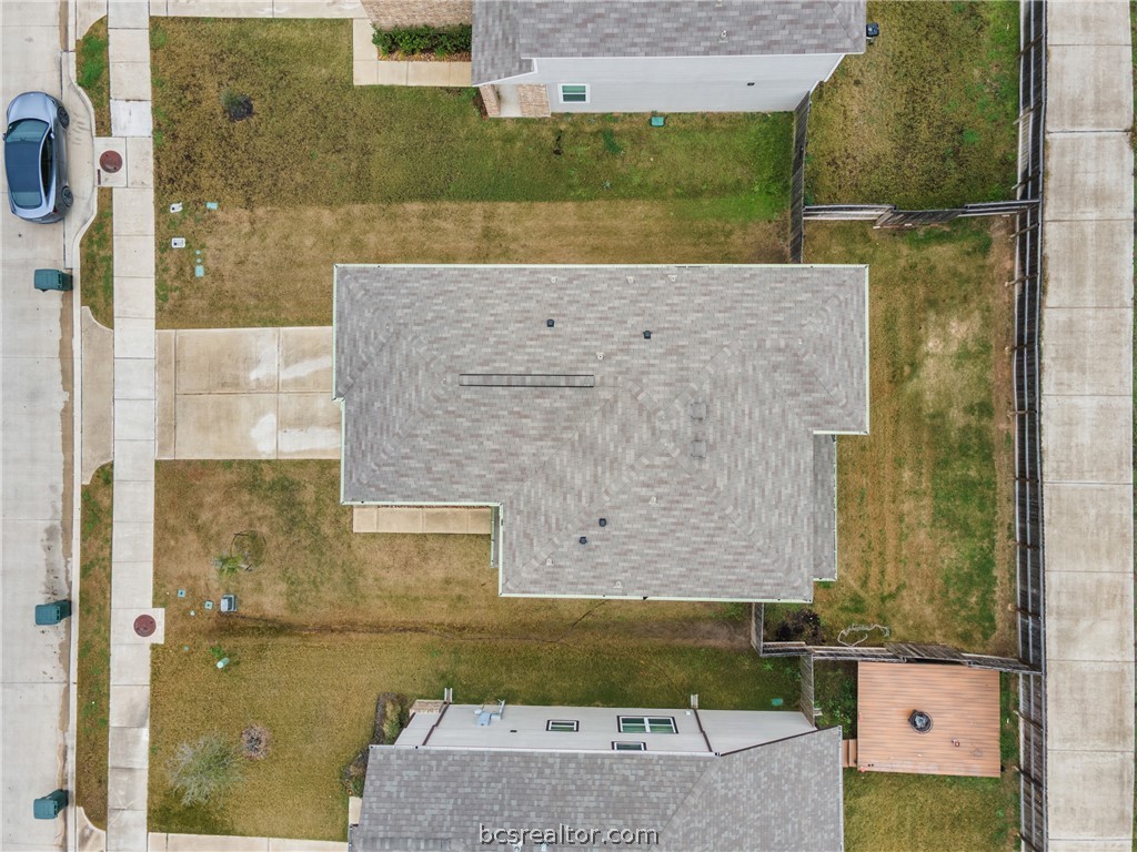 984 Crossing Drive Bryan, TX 77803 - Photo 26 of 29 an aerial view of a house with a yard