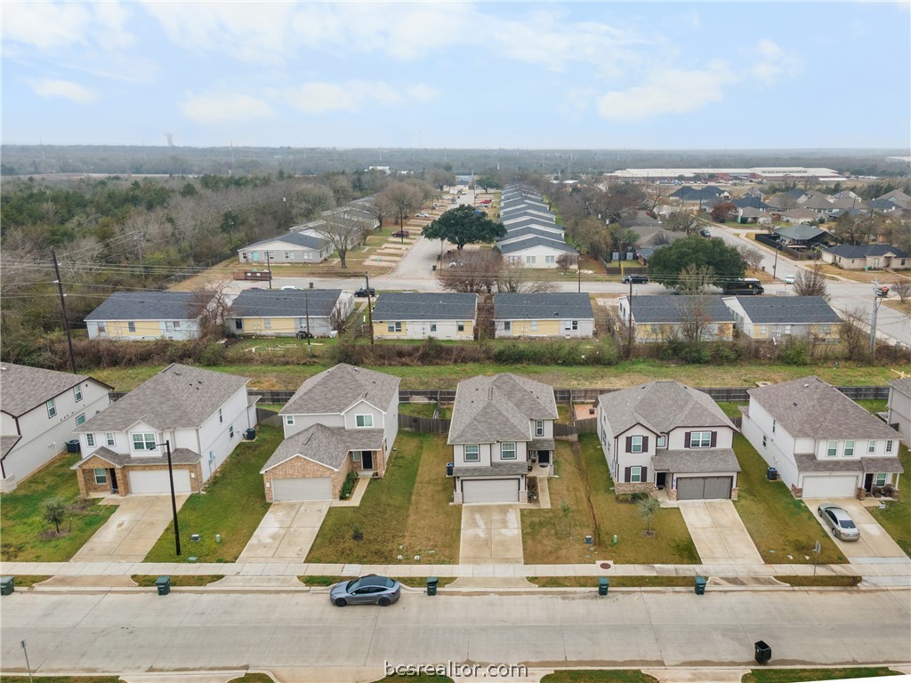 984 Crossing Drive Bryan, TX 77803 - Photo 28 of 29 an aerial view of residential houses with outdoor space