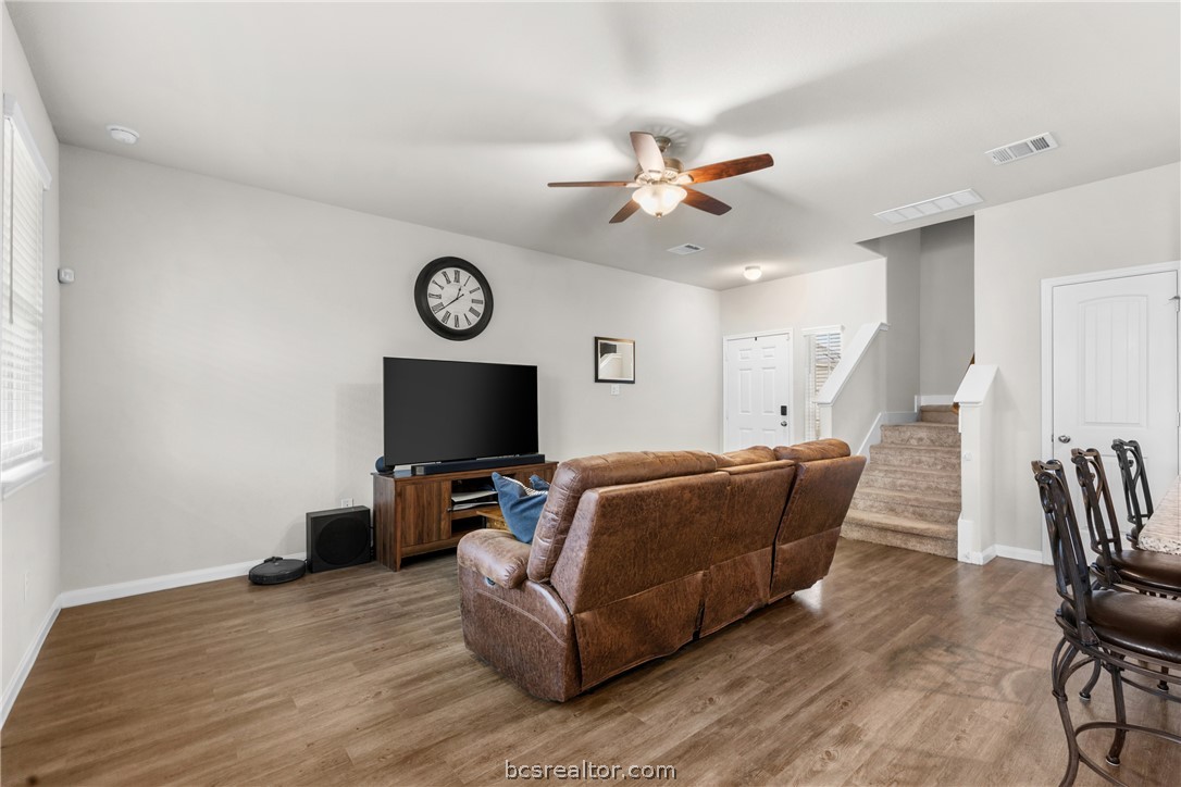 984 Crossing Drive Bryan, TX 77803 - Photo 8 of 29 a living room with furniture and a flat screen tv