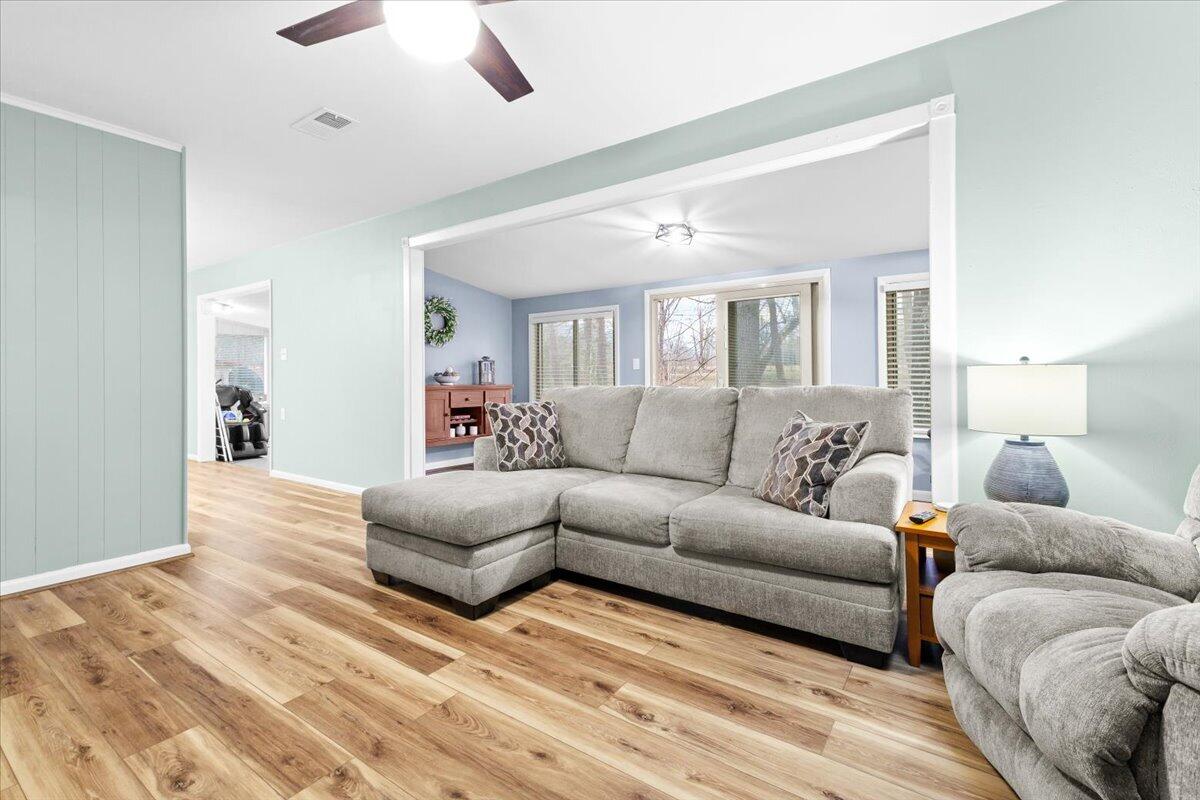 6742 Upper Craigs Creek Road Catawba, VA 24070 - Photo 13 of 23 a living room with furniture white walls and wooden floor
