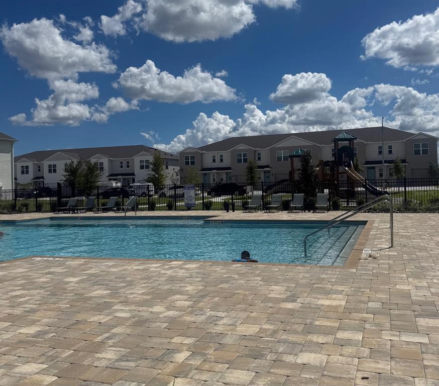 1642 Rock Elm Road Davenport, FL 33837 - Photo 24 of 27 a view of building with outdoor space