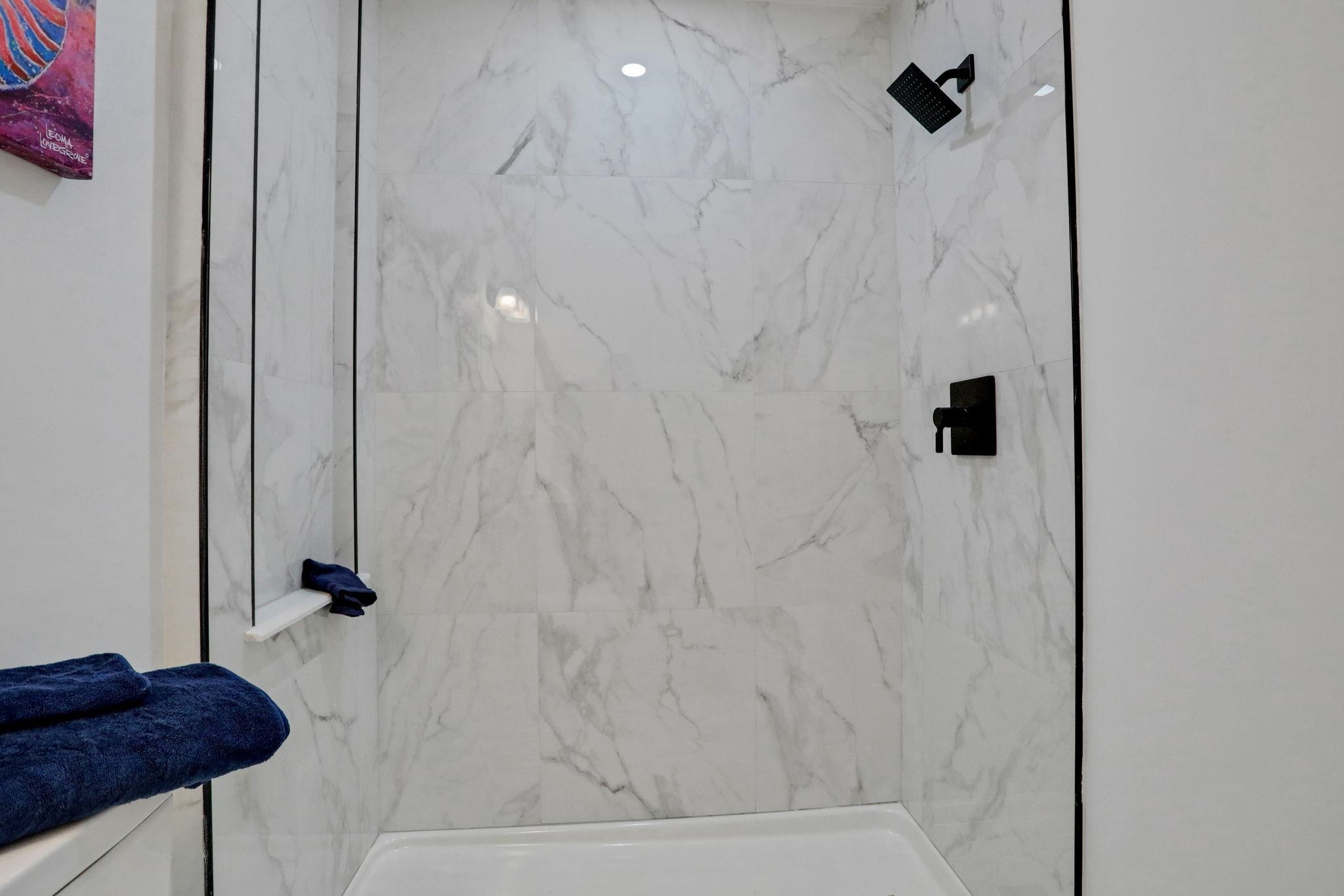 166 School Street St. Augustine, FL 32084 - Photo 31 of 44 a bathroom with a granite countertop shower