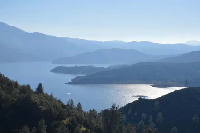 a view of lake and mountain
