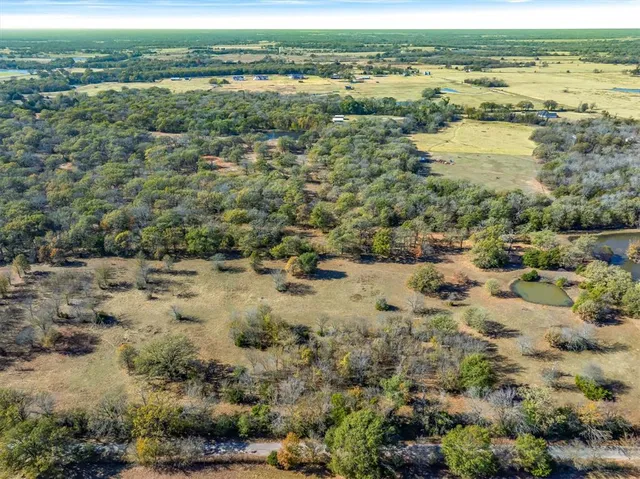 a view of a city with an ocean