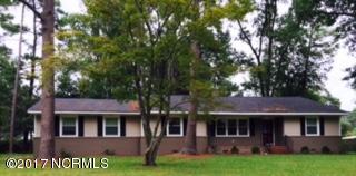 1217 Stockton Road Kinston, NC 28504 - Photo 1 of 20 Front of House with Hardwood Trees and Pines..Magnolia in back yard