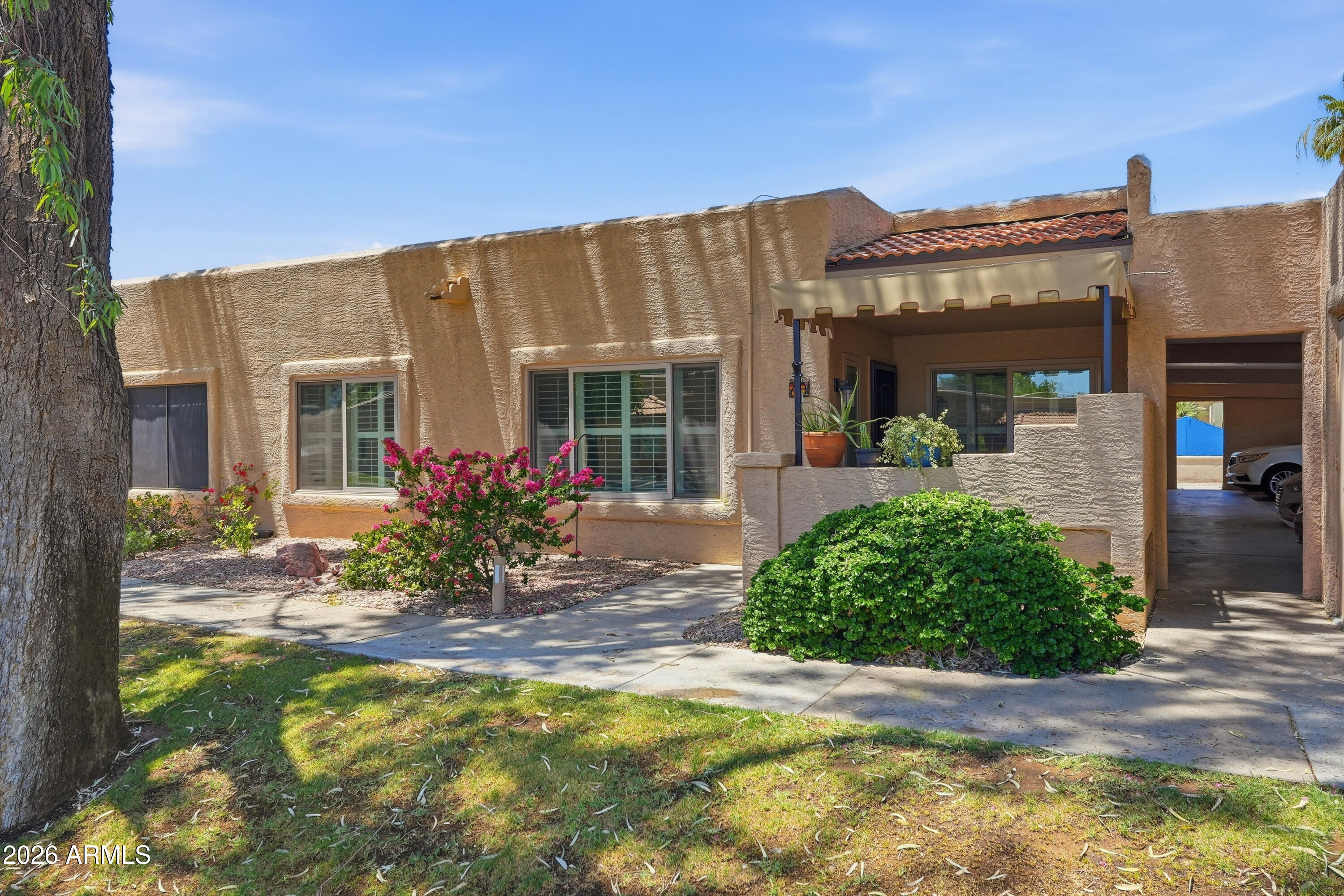 front view of a house with a patio