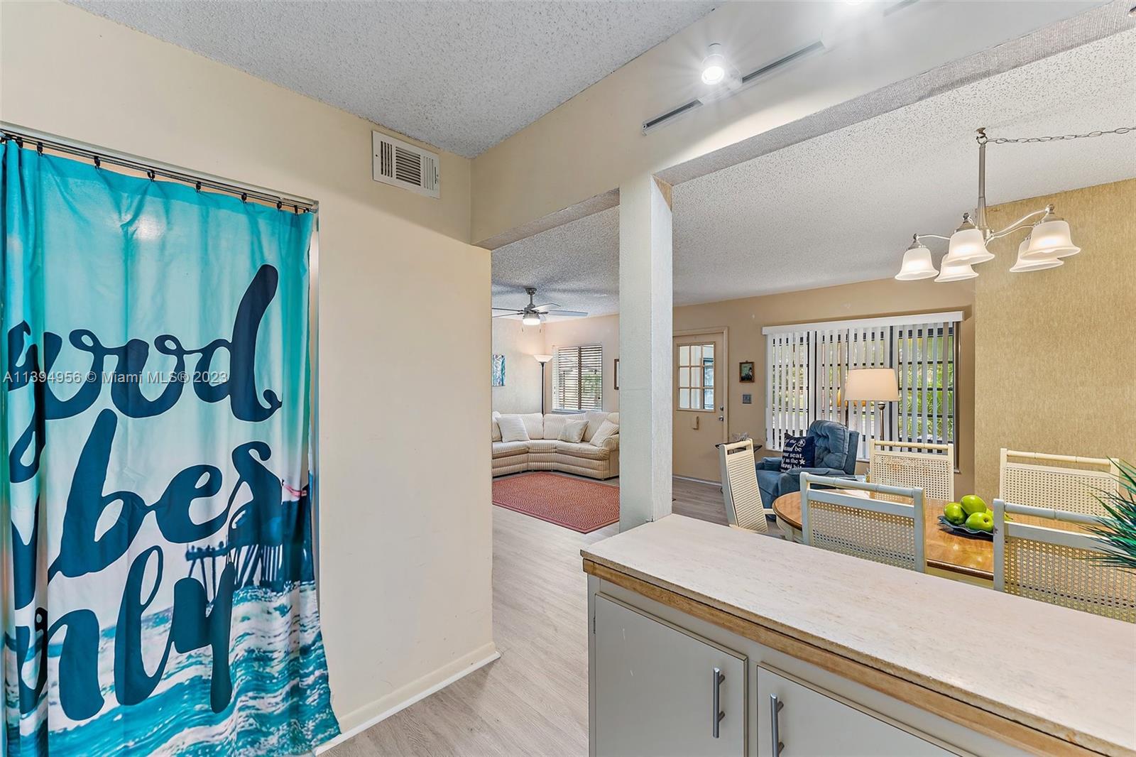 307 Pine Ridge Circle, Unit D2 Greenacres, FL 33463 - Photo 16 of 41 a kitchen with a sink and a refrigerator