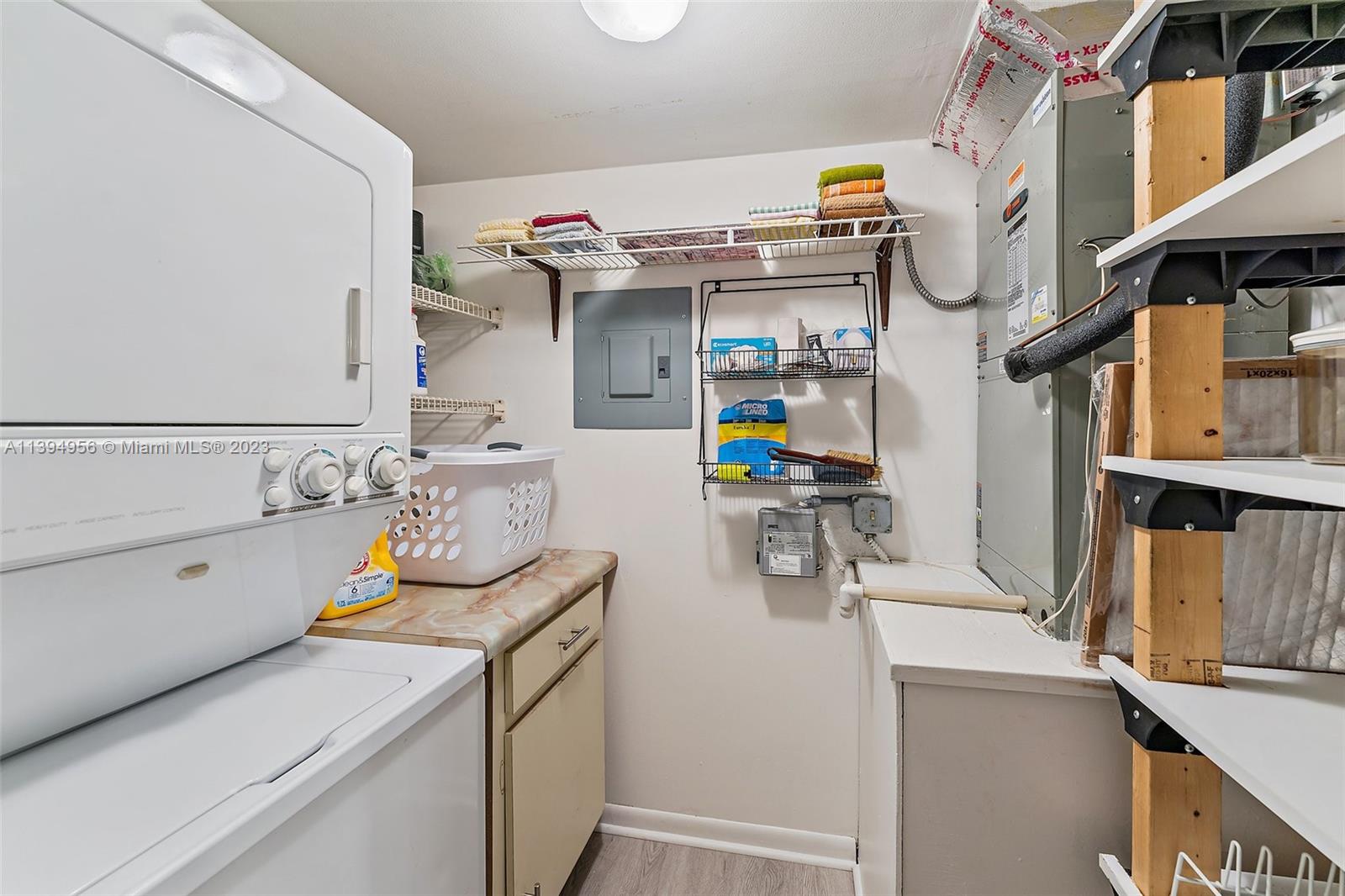 307 Pine Ridge Circle, Unit D2 Greenacres, FL 33463 - Photo 17 of 41 a utility room with dryer and washer