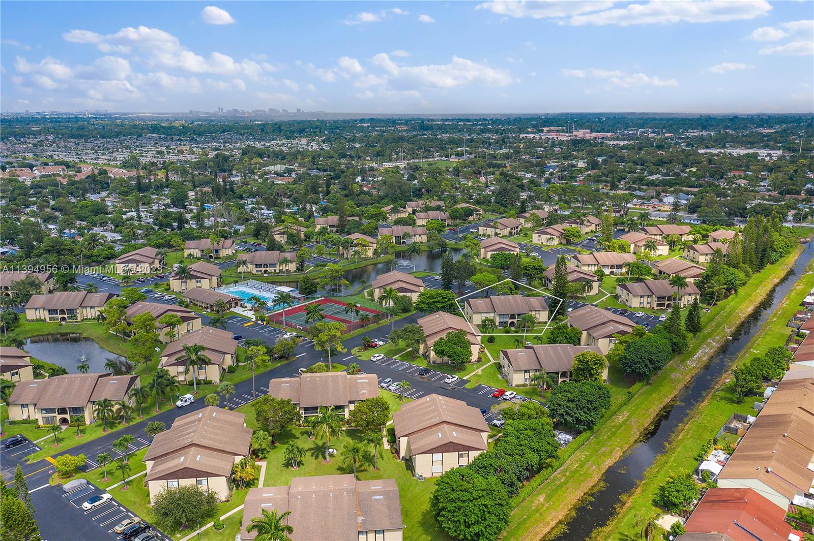307 Pine Ridge Circle, Unit D2 Greenacres, FL 33463 - Photo 36 of 41 an aerial view of residential houses with outdoor space