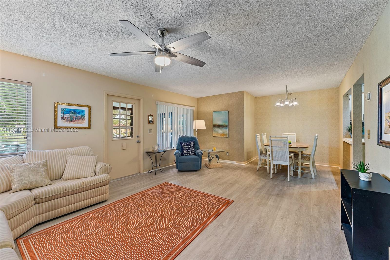 307 Pine Ridge Circle, Unit D2 Greenacres, FL 33463 - Photo 10 of 41 a living room with furniture