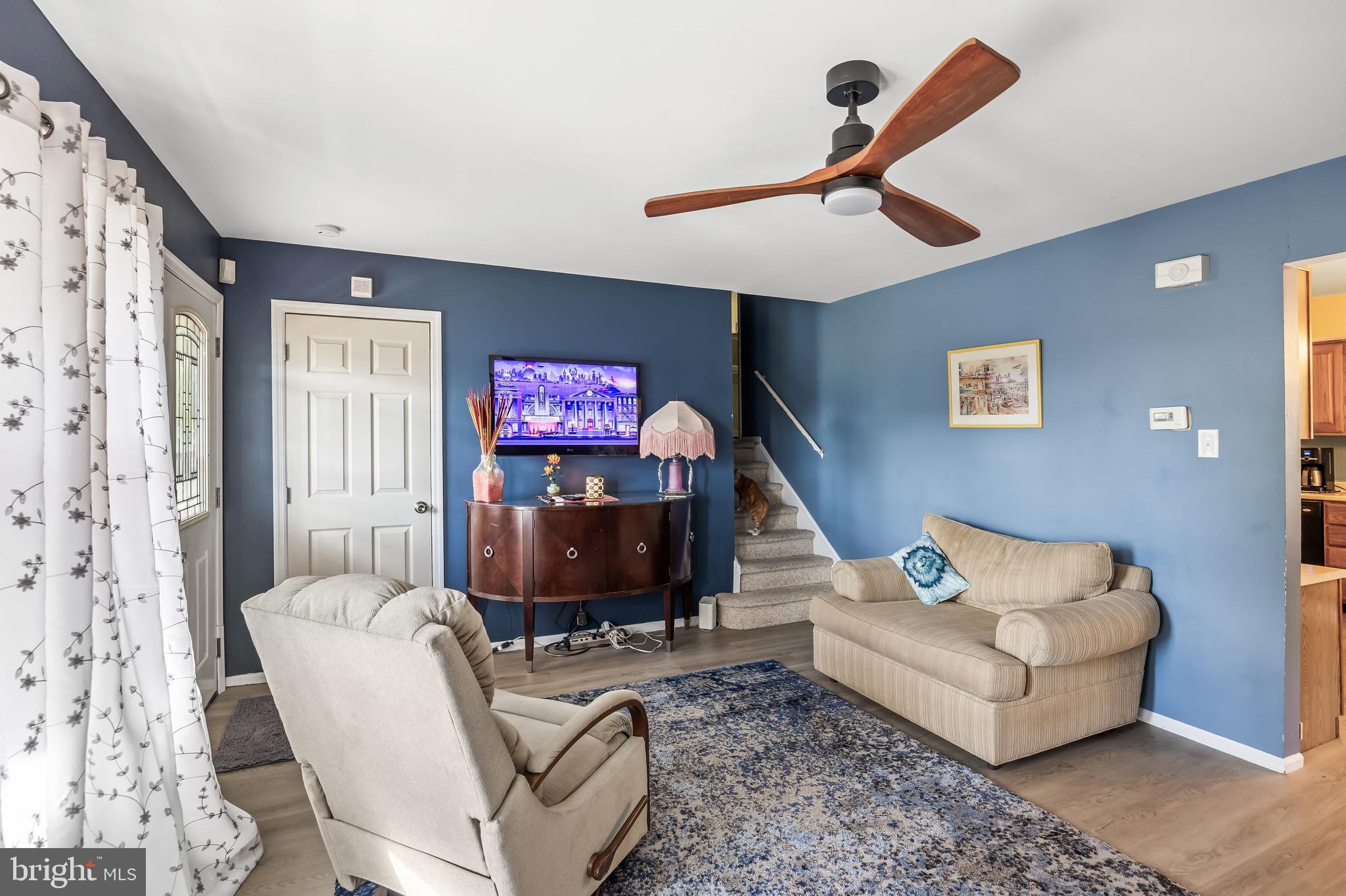 109 North Ambler Road Somers Point, NJ 08244 - Photo 6 of 22 a living room with furniture and a flat screen tv