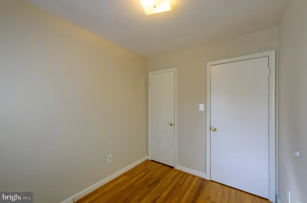 a view of small space with wooden floor