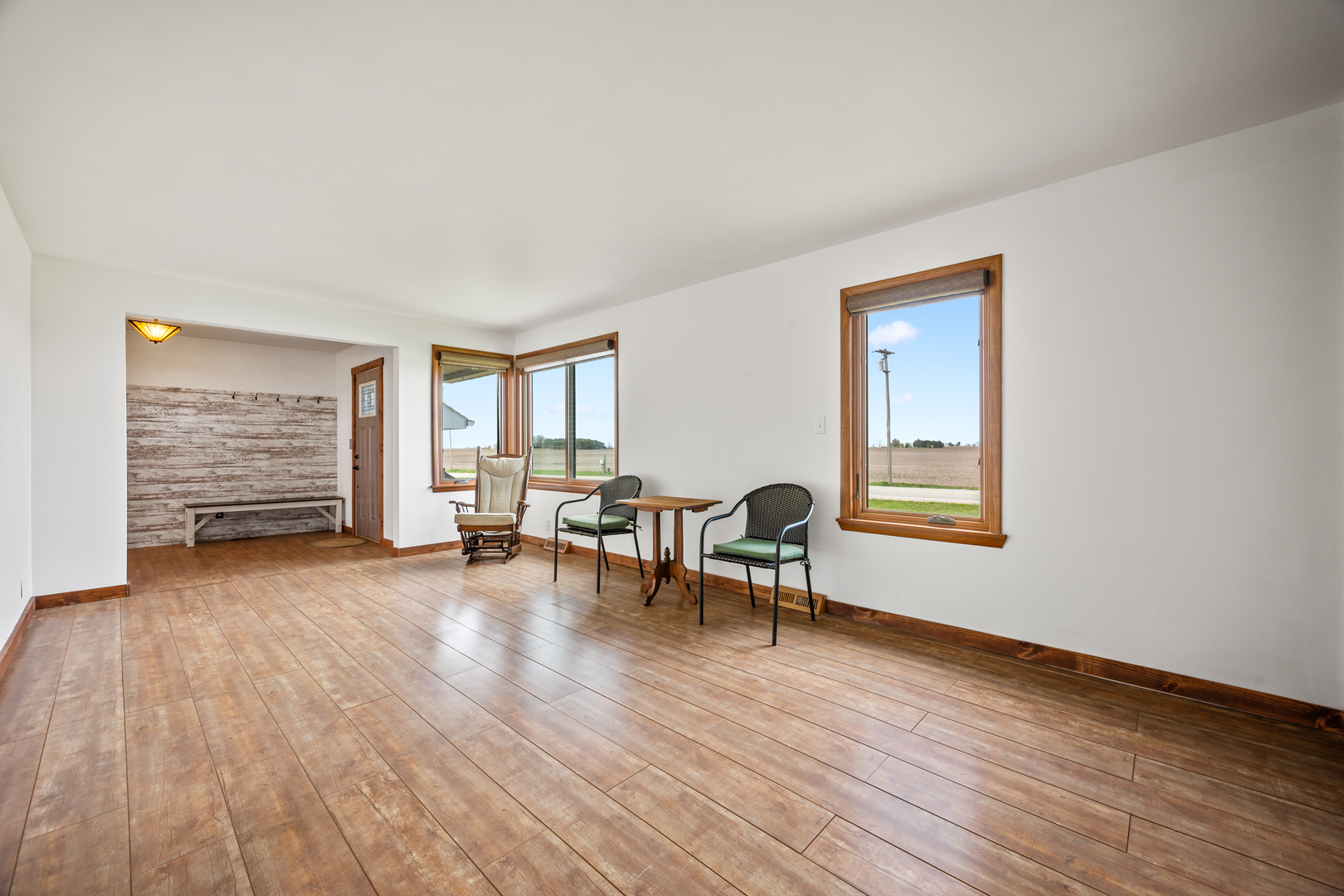 1540 East 950th Road Tonica, IL 61364 - Photo 4 of 38 a view of empty room with wooden floor and fan