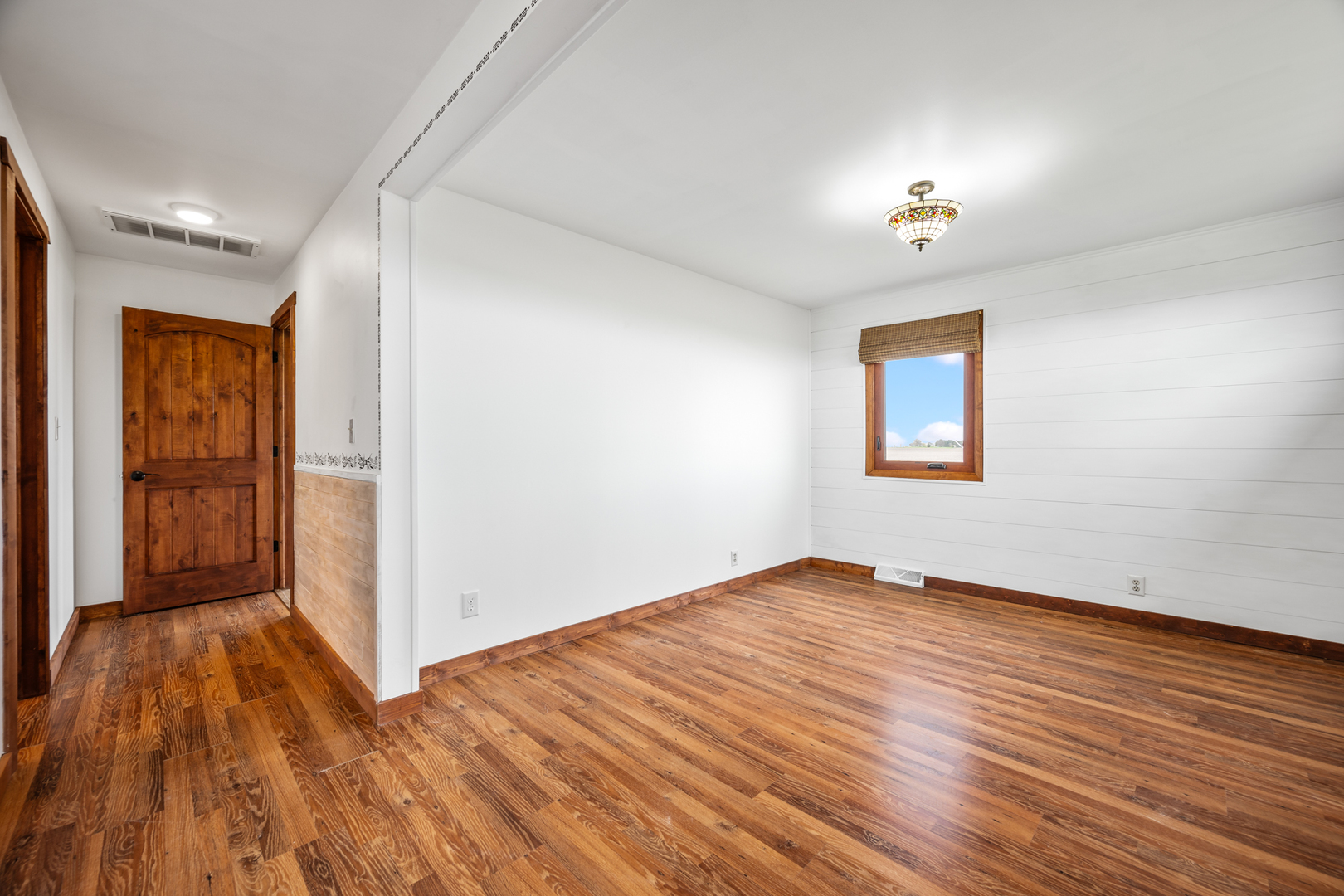 1540 East 950th Road Tonica, IL 61364 - Photo 6 of 38 wooden floor in an empty room with a window