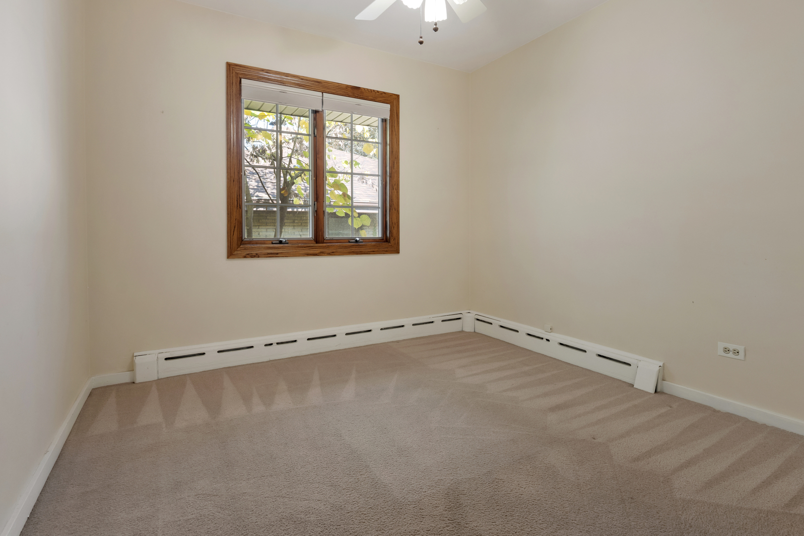 240 Scott Avenue Glen Ellyn, IL 60137 - Photo 13 of 25 a view of an empty room with a window