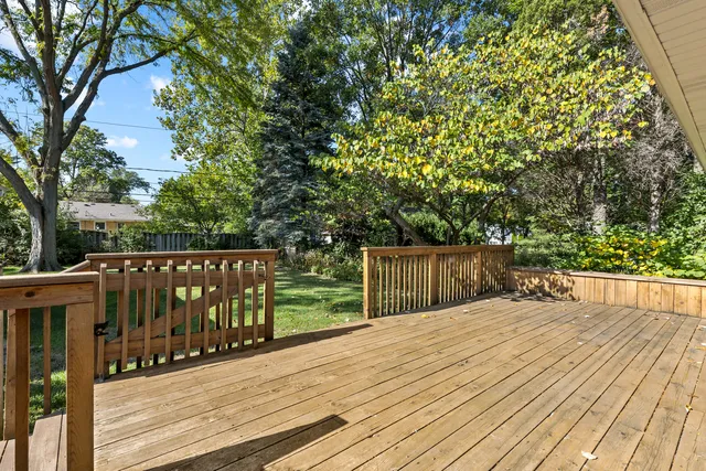 a view of balcony and deck with wooden floor and fence