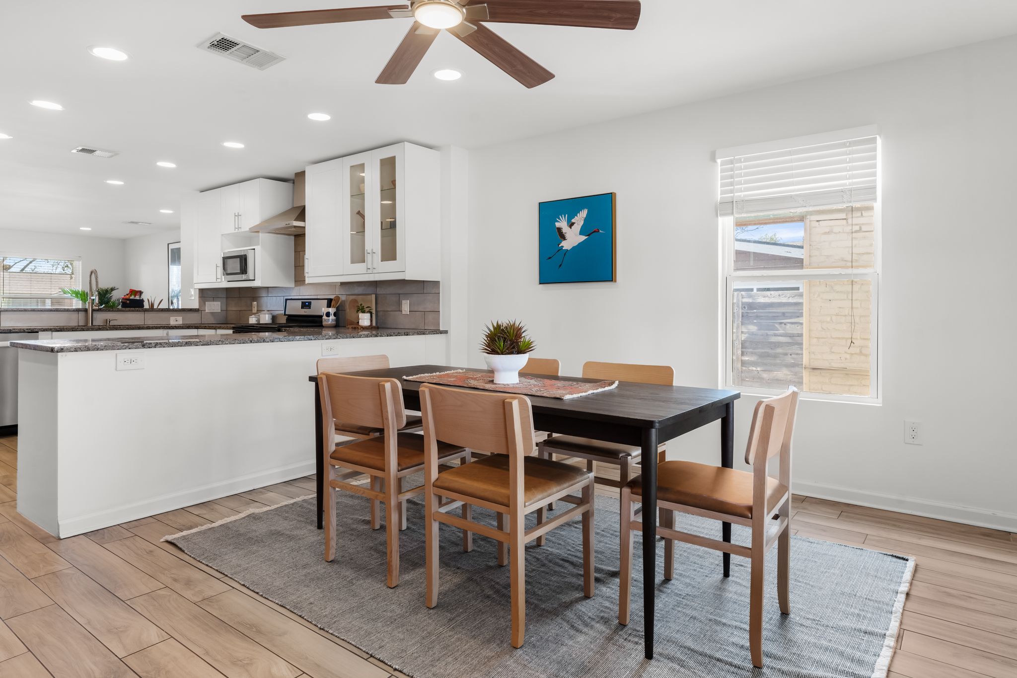 1900 Ohlen Road Austin, TX 78757 - Photo 12 of 34 Dining room featuring light wood-style floors, a ceiling fan, and recessed lighting