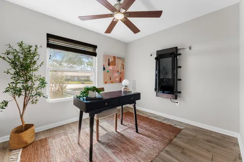a living room with furniture and a window