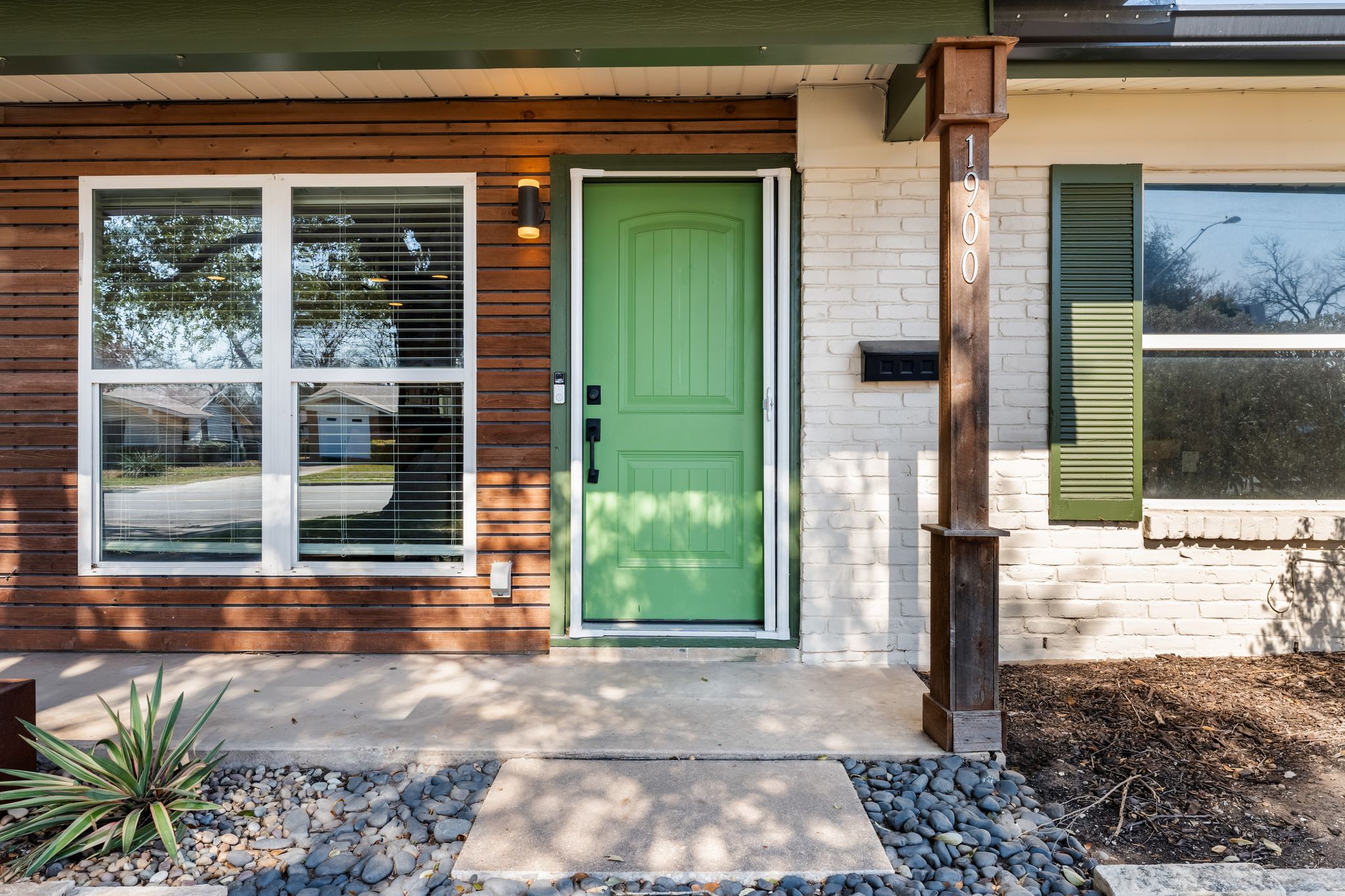 1900 Ohlen Road Austin, TX 78757 - Photo 2 of 34 Entrance to property with brick siding and covered porch