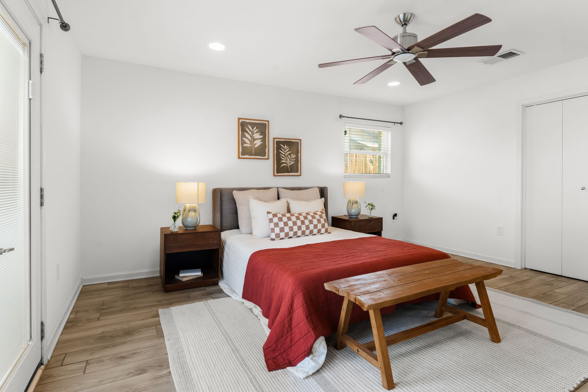 1900 Ohlen Road Austin, TX 78757 - Photo 22 of 34 Bedroom with 2 closets, light wood-type flooring, recessed lighting, and a ceiling fan