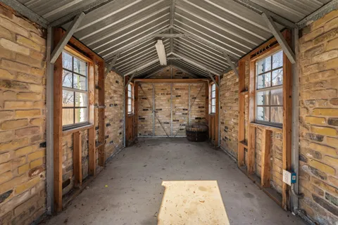 a view of a porch with furniture