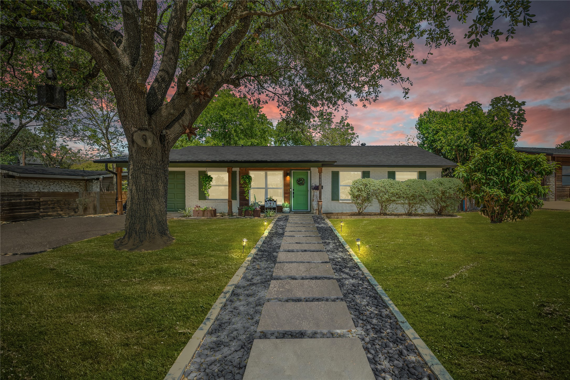 1900 Ohlen Road Austin, TX 78757 - Photo 33 of 34 Ranch-style home featuring a lawn
