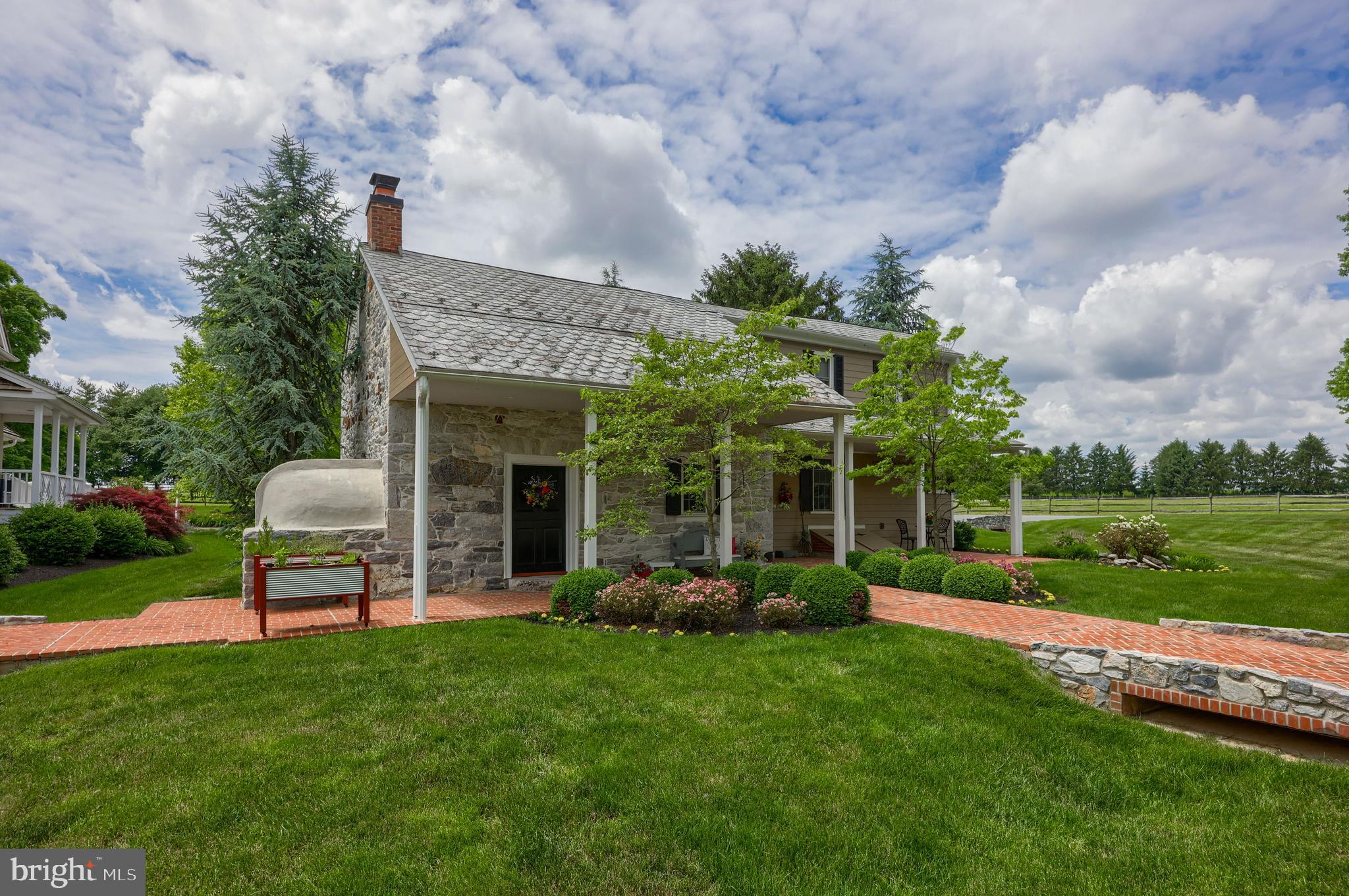 1610 Landis Road Mount Joy, PA 17552 - Photo 21 of 150 a view of a house with a backyard and a garden