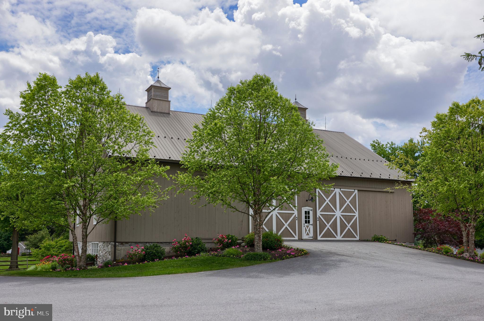 1610 Landis Road Mount Joy, PA 17552 - Photo 26 of 150 a front view of a house with garden
