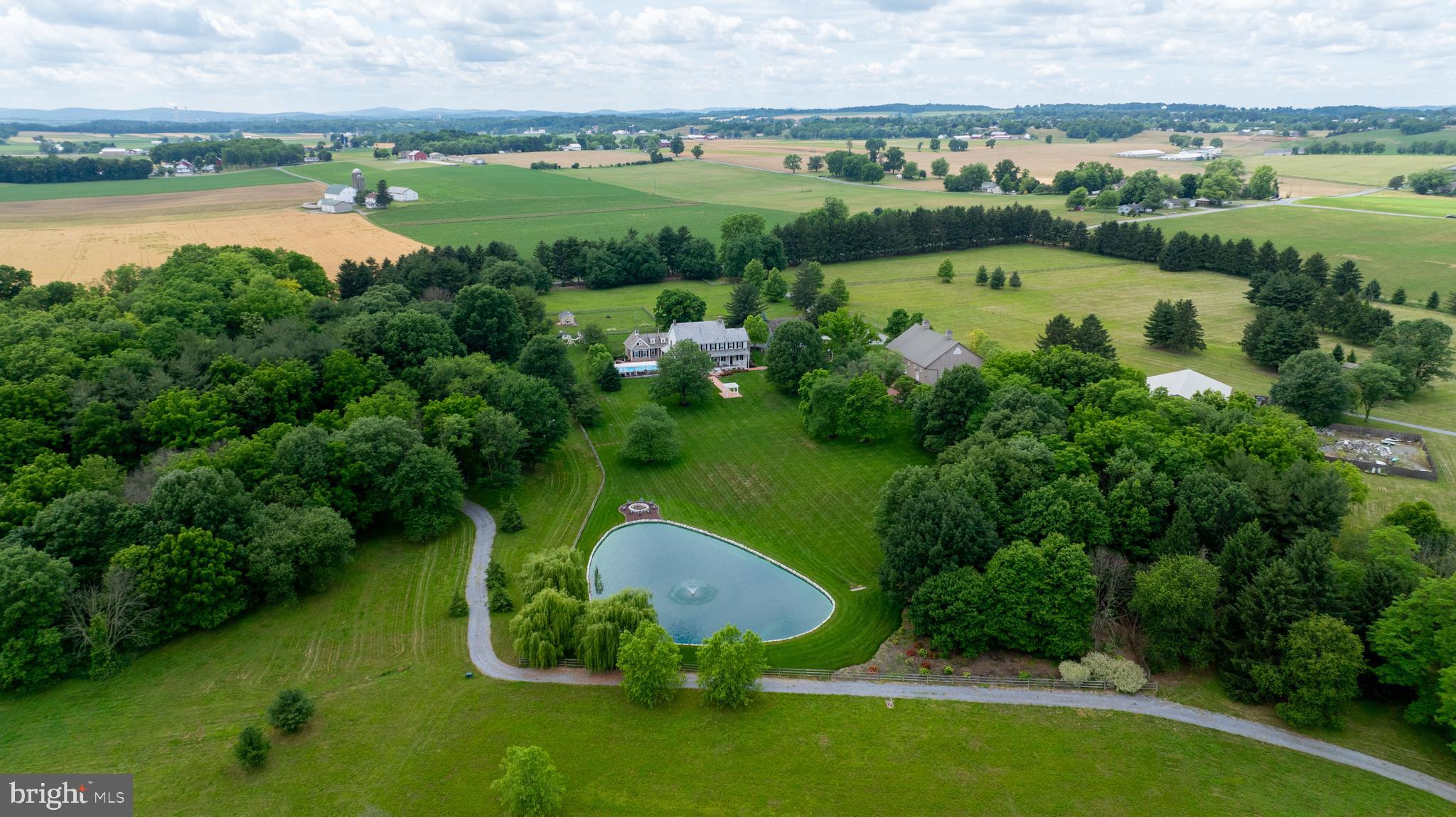 1610 Landis Road Mount Joy, PA 17552 - Photo 3 of 150 an aerial view of a houses with outdoor space swimming pool and mountains