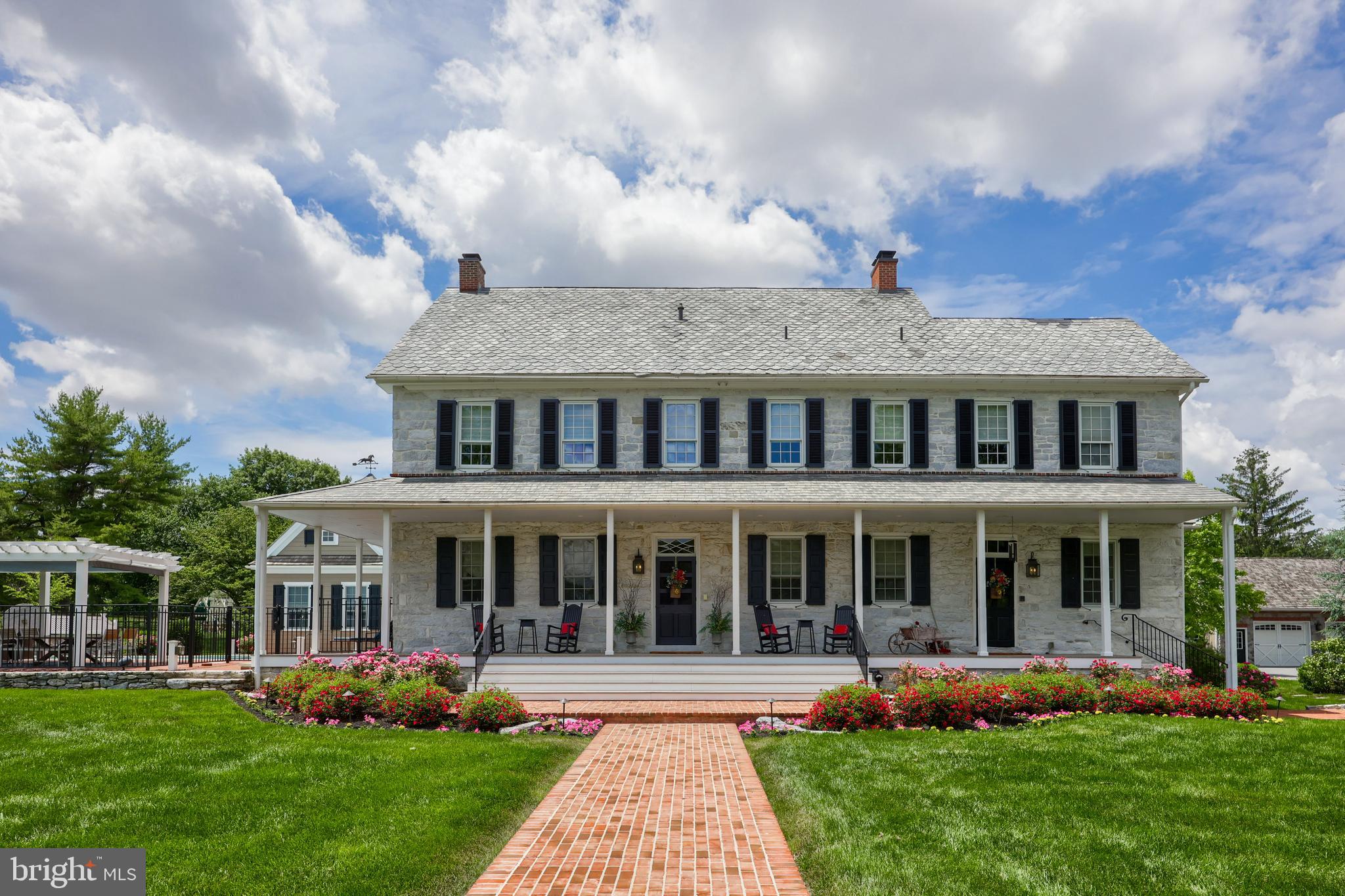 1610 Landis Road Mount Joy, PA 17552 - Photo 43 of 150 a front view of a house with a yard table and chairs